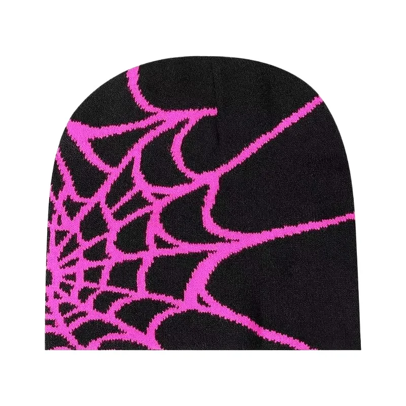 Black knit beanie with a magenta spiderweb motif