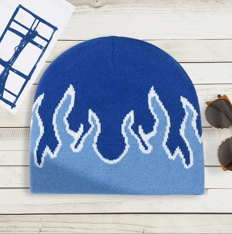 Blue knitted beanie featuring a lighter flame-shaped pattern