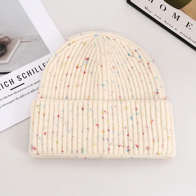 Cream rib knit cuffed beanie with multicoloured flecks