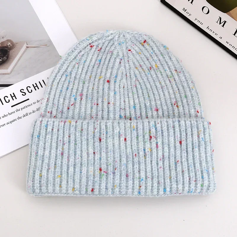 Pale blue rib knit cuffed beanie with multicoloured flecks