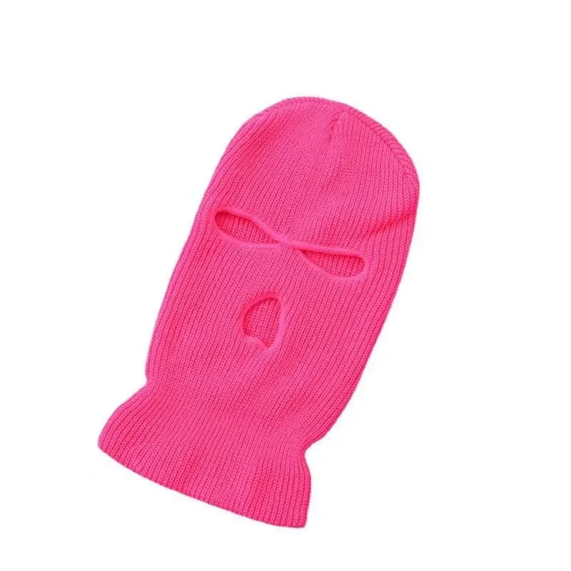 Pink three opening knit face covering laid flat