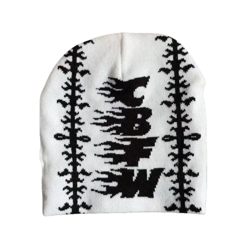 White knit beanie with black graphic and border motifs